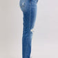 Side view of Judy Blue button fly distressed jeans with pockets, perfect casual wear for plus-size style.