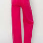 High Rise Wide Leg Jeans in vibrant pink, featuring a flattering fit and retro style. Perfect addition to your Risen Jeans collection.