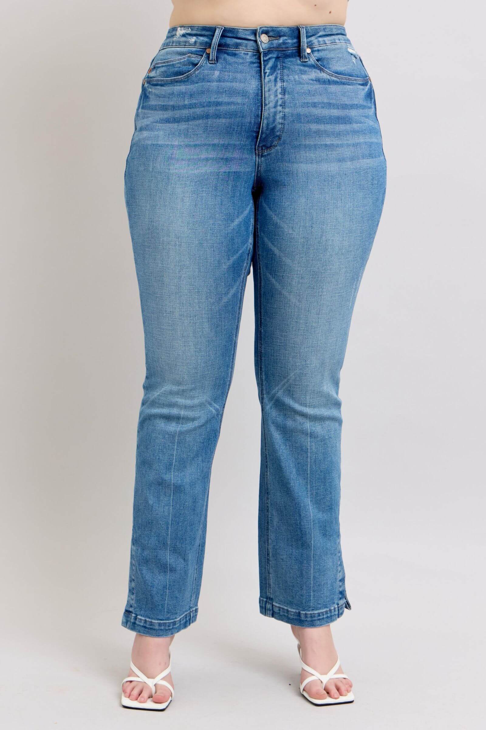 Judy Blue high waist vintage wash bootcut jeans with tummy control and a stylish fit, featuring a modern side slit detail.