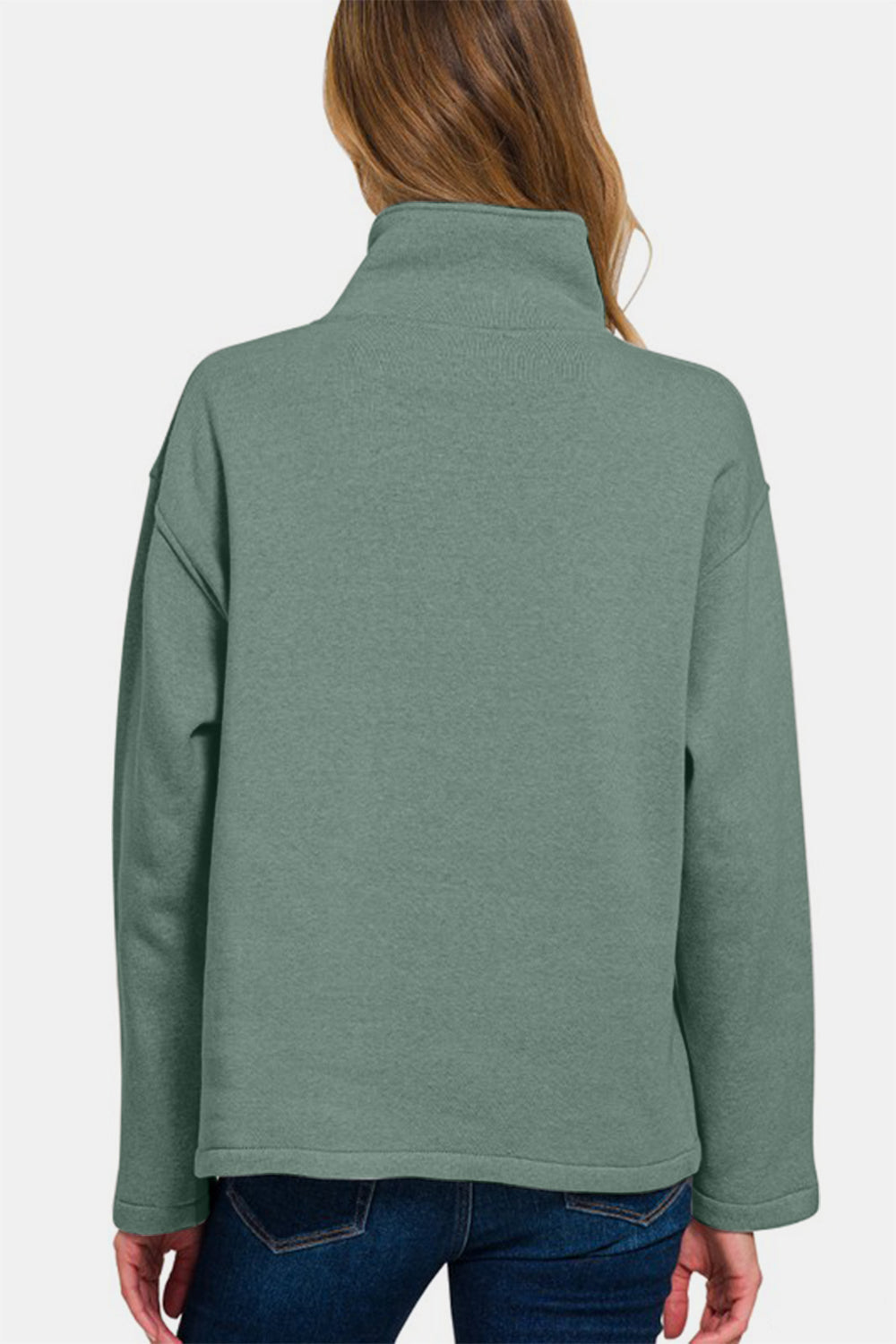 Back view of Zenana Turtleneck Half Snap Fleece Sweatshirt in soft green, showcasing cozy style and comfort.