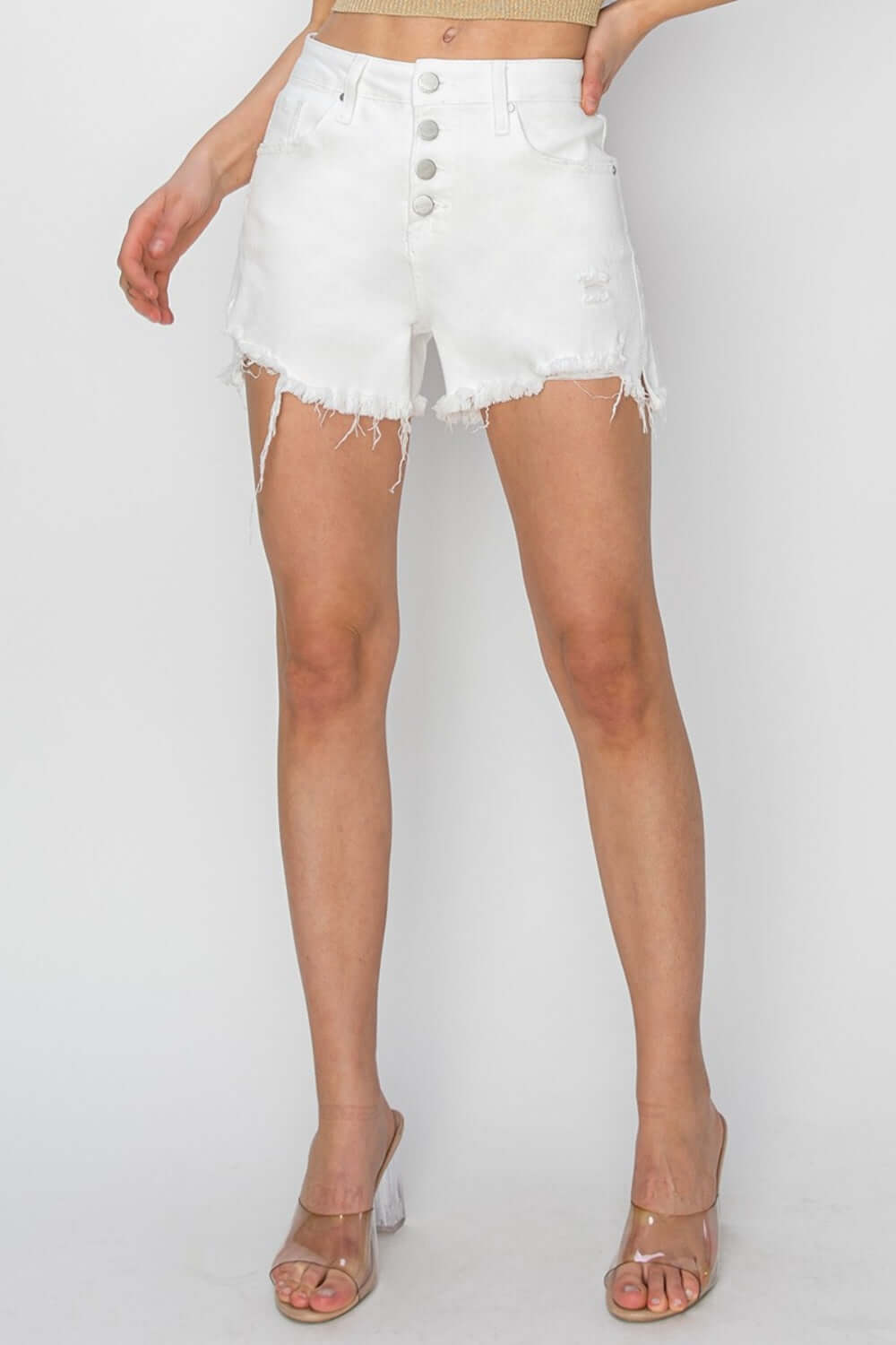 Risen Jeans Button Fly Frayed Hem Denim Shorts in white, modeled with a chic summer look, showcasing stylish button fly closure and frayed hem detailing.