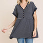 Woman wearing Striped Button Front Baby Doll Top with short sleeves and a flowing hem, paired with jeans.