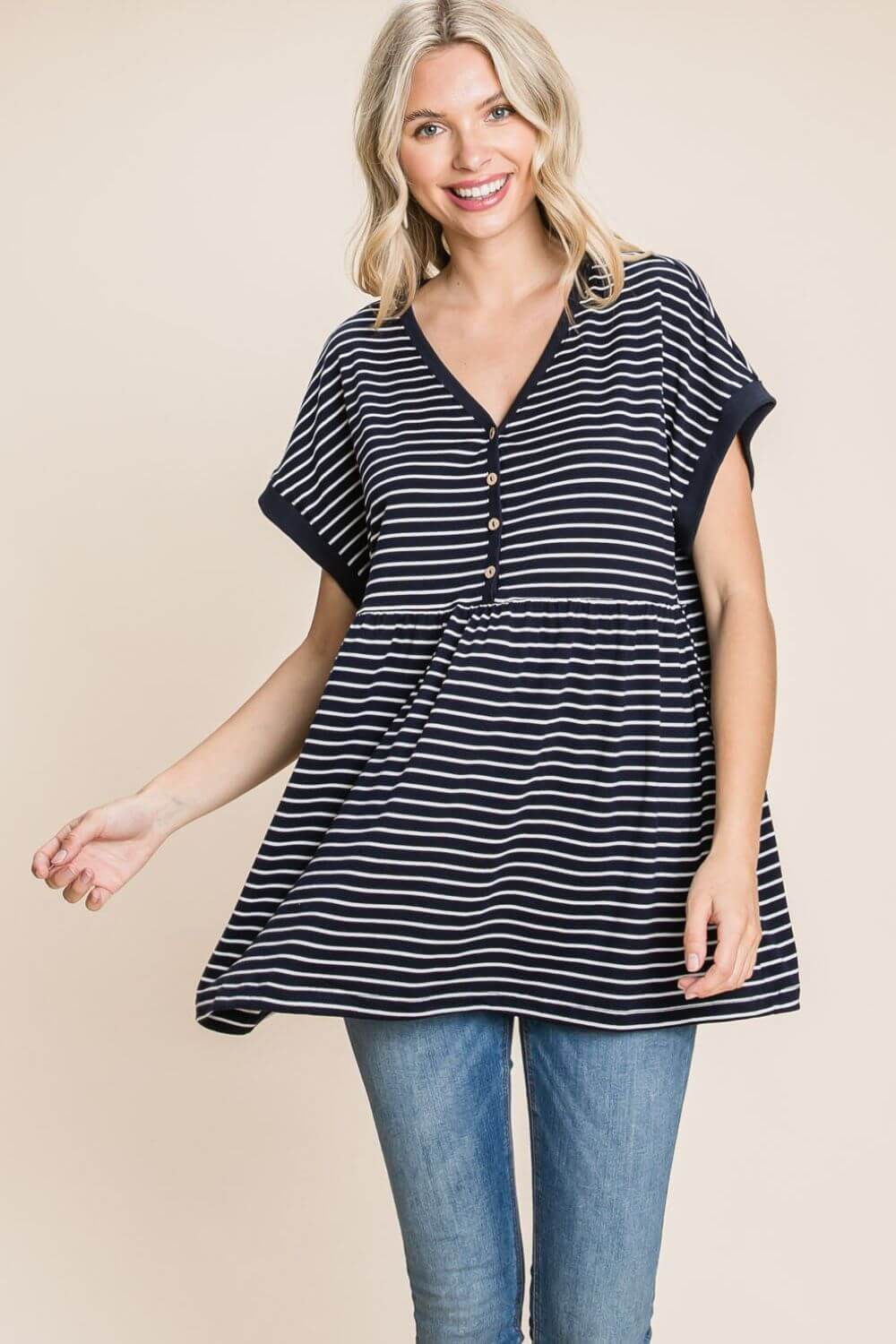 Woman wearing Striped Button Front Baby Doll Top with short sleeves and a flowing hem, paired with jeans.