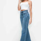 Model showcasing bytos high rise wide leg jeans with pockets, styled with a chic crop top. Perfect for trendy outfits!