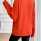 Back view of Ivy Lane Half Zip Raglan Sleeve Sweatshirt in vibrant orange, featuring a comfortable fit and stylish design.