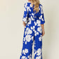 DOUBLE TAKE Full Size Printed Tie Back Wide Leg Jumpsuit at Bella Road