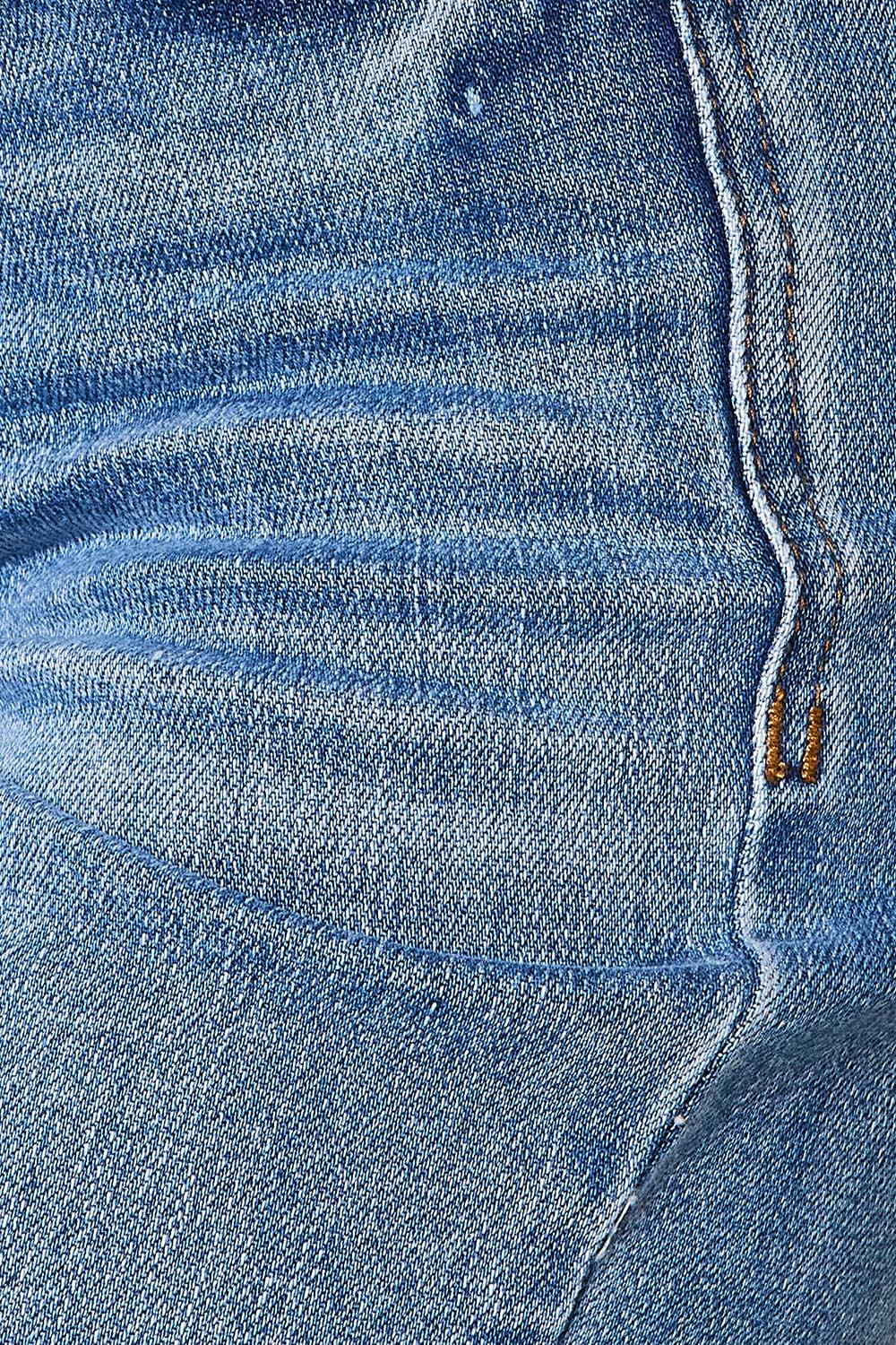 Close-up view of high waist distressed jeans fabric showing details of stitching and texture in Judy Blue Jeans.