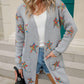 Woman wearing an Angel Wings Star Open Front Long Sleeve Cardigan with colorful stars, adding a playful touch to her chic street style.