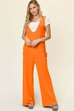 DOUBLE TAKE Full Size Sleeveless Wide Leg Jumpsuit with Pockets at Bella Road