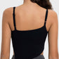 Back view of the Millennia Slit Asymmetrical Neck Active Cami, showcasing its stylish design and adjustable straps.