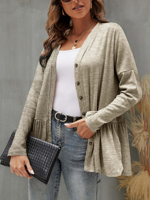 Woman wearing FAM-FAM Ruffled Button Up Long Sleeve Cardigan in khaki, styled with jeans and a black clutch for a chic look.