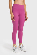 Millennia high waist ankle-length yoga leggings in vibrant pink, perfect for stylish workouts and yoga sessions.