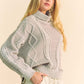 Cozy gray Davi & Dani cable-knit turtleneck sweater with a relaxed dropped shoulder silhouette. Perfect for chilly days!