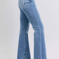 Side view of Judy Blue high rise bootcut jeans with raw hem, showcasing a trendy and flattering silhouette.