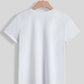 Back view of a white Bella Road Mardi Gras Graphic T-Shirt on a hanger, showcasing its round neck and short sleeves.