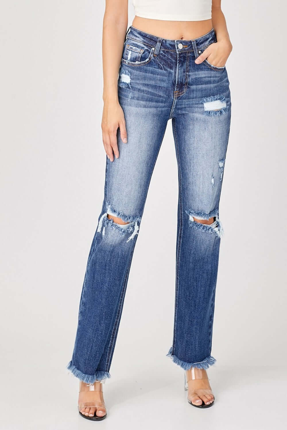 Raw hem distressed straight Risen jeans with a worn-in vibe for casual cool style, perfect for urban chic everyday outfits.