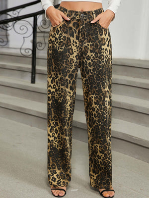 Woman wearing leopard print jeans with pockets and buttoned front