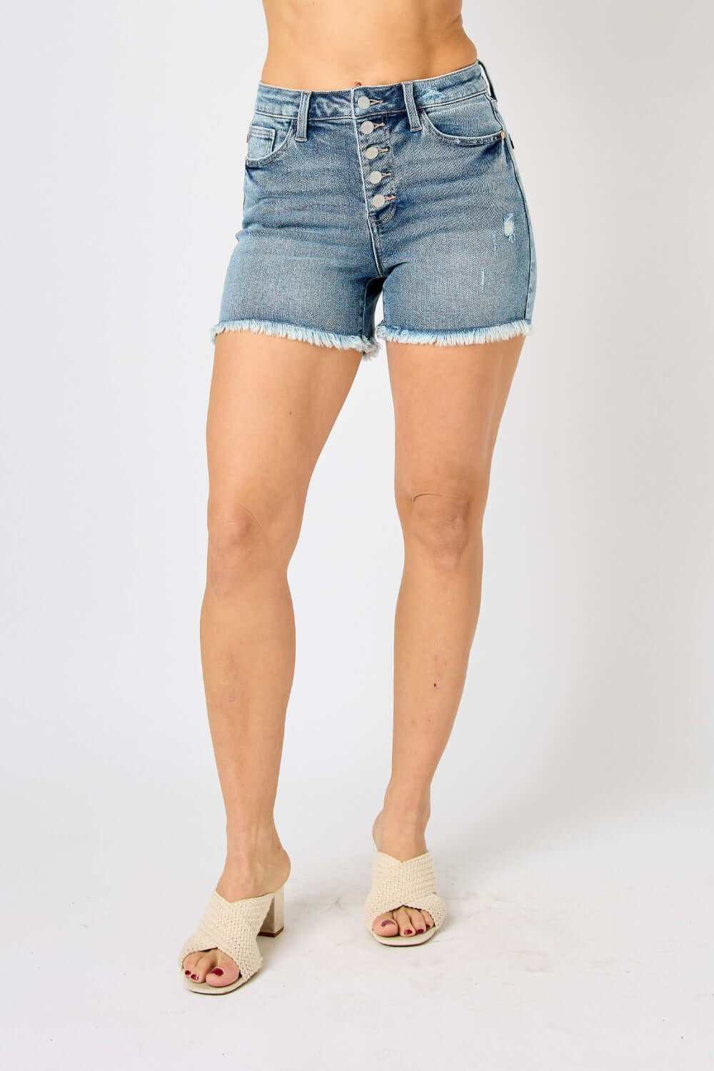 Button Fly Raw Hem Denim Shorts by Judy Blue Jeans - Trendy and stylish with high-quality denim, perfect for casual outfits and summer days