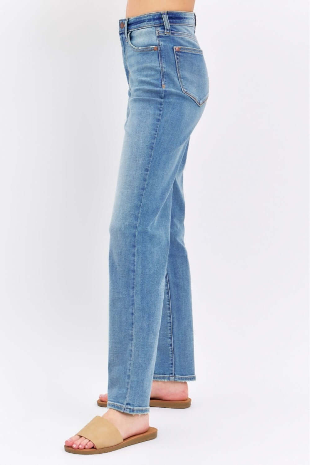 High Waist Straight Judy Blue Jeans full size with a flattering silhouette and classic straight leg cut, shown on a model from the side.