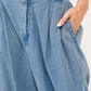 Elastic back pleated baggy jeans with pocket, showcasing relaxed fit and stylish pleated detail for casual outings.