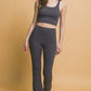 Model showcasing Love Tree High Waist Flare Leggings with side pockets, perfect for activewear and everyday comfort.