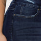 Close-up of Cat's Whiskers Raw Hem High Waist Jeans showcasing the vintage-inspired raw hem detailing and high-quality denim fabric