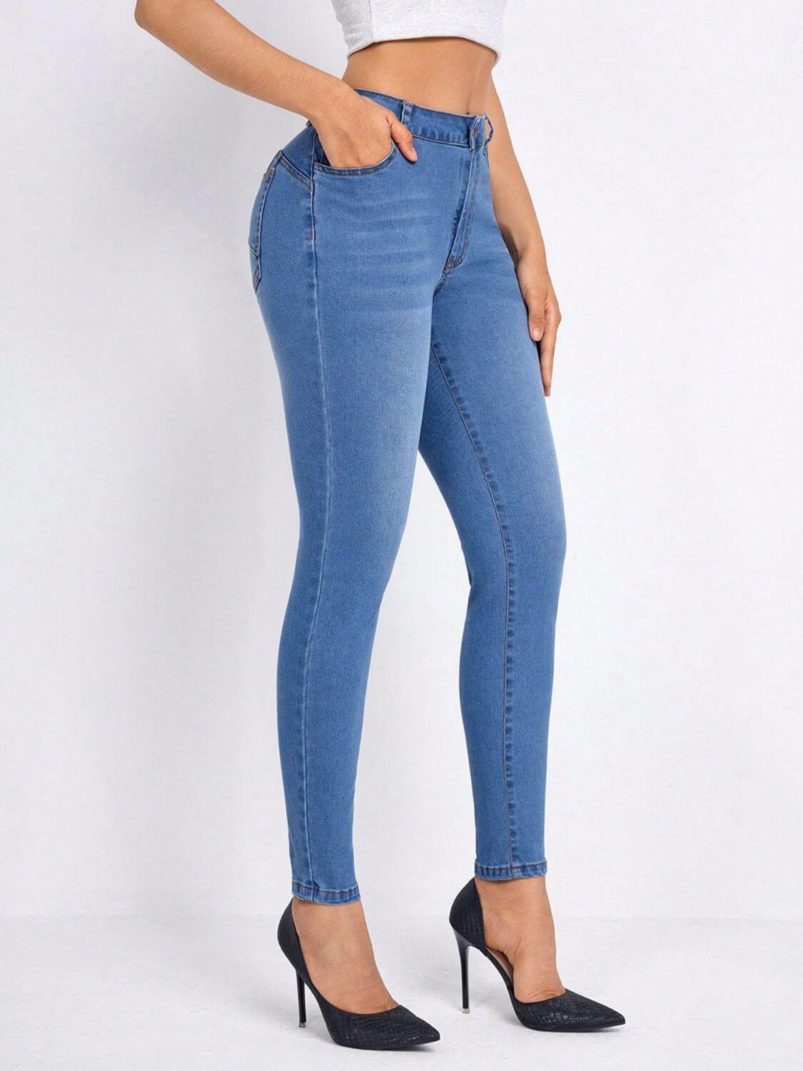 Bella Road High Rise Skinny Jeans with Pockets, buttoned, in blue with moderate stretch, worn with black heels - 85% cotton, 15% polyester