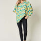 DOUBLE TAKE Full Size Printed Smocked Long Sleeve Blouse at Bella Road