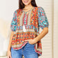 DOUBLE TAKE Bohemian Tassel Tie Puff Sleeve Babydoll Blouse at Bella Road