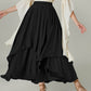 Black Bella Road Smocked Waist Band Ruched Layered Skirt with chic flair and playful design.