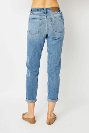 Back view of cuffed low waist hem slim jeans by Judy Blue Jeans in full size showing modern and trendy denim style.