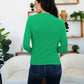 Woman wearing FAM-FAM Ruched Mock Neck Long Sleeve T-Shirt in green, perfect for fall style and layering. Cozy and on-trend.