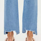 High Waist Raw Hem Straight Jeans with frayed edges, featuring a stylish and flattering high waist design, paired with casual heels.