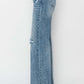 High waist distressed wide leg Risen Jeans with trendy design and edgy flair on model