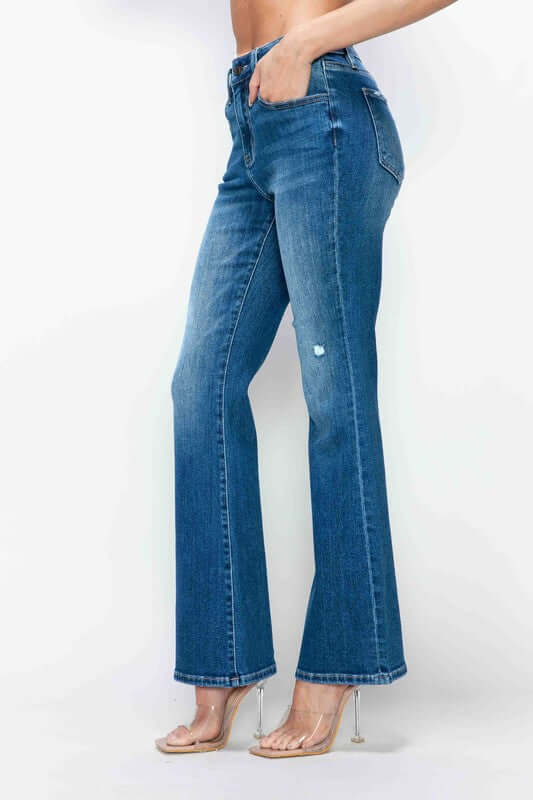 Woman wearing bytos high rise bootcut jeans with pockets, showcasing a flattering fit and stylish silhouette.