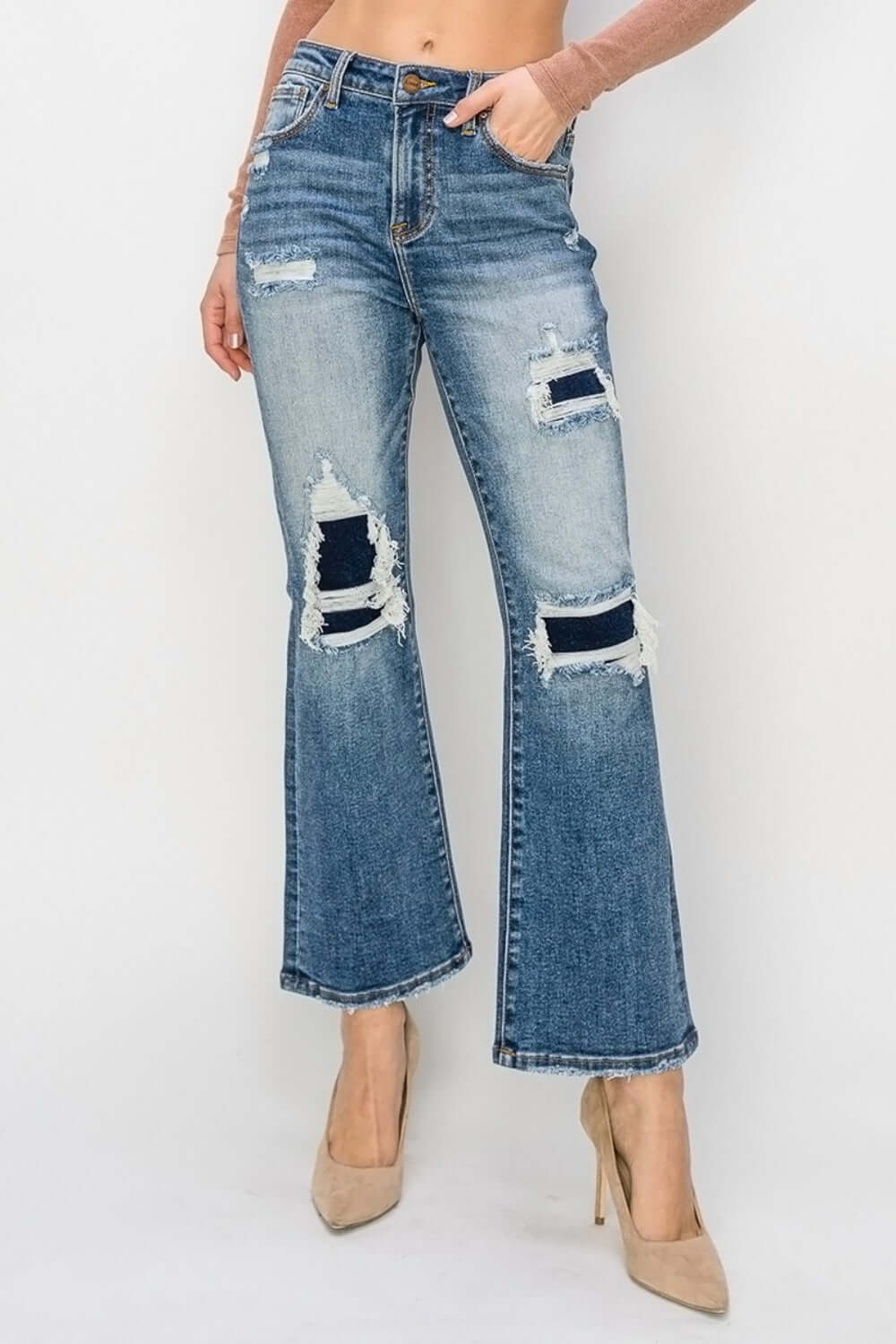 High Rise Distressed Ankle Flare Jeans by Risen Jeans, trendy and chic with high rise fit, distressed details, and ankle flare cut