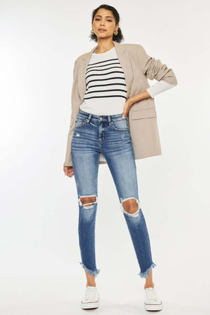 High Waist Distressed Raw Hem Ankle Skinny Jeans styled with a striped top and blazer, perfect for a trendy and edgy look.