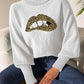 Bella Road Lip Turtleneck Sweater with leopard print design, modeled mid-shot, emphasizing its playful and stylish features.