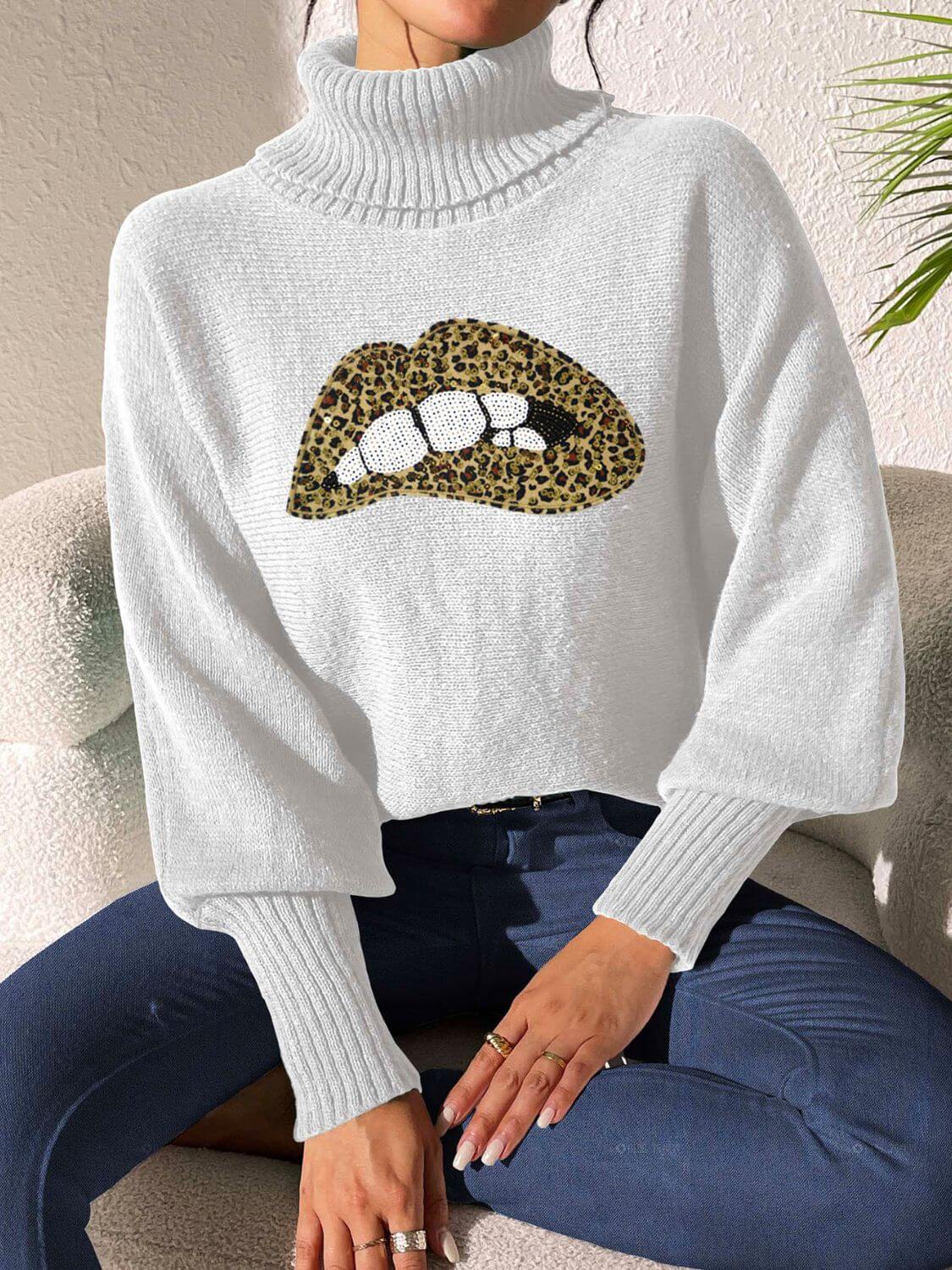 Bella Road Lip Turtleneck Sweater with leopard print design, modeled mid-shot, emphasizing its playful and stylish features.