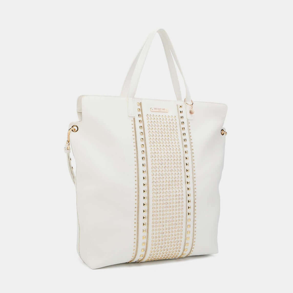 Nicole Lee USA studded large tote bag in vegan leather with dual top handles, featuring stud and zipper detailing and optional shoulder strap.