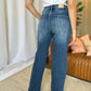 High rise tummy control wide leg jeans, back view, showing smooth midsection with relaxed, stylish silhouette, worn with white top