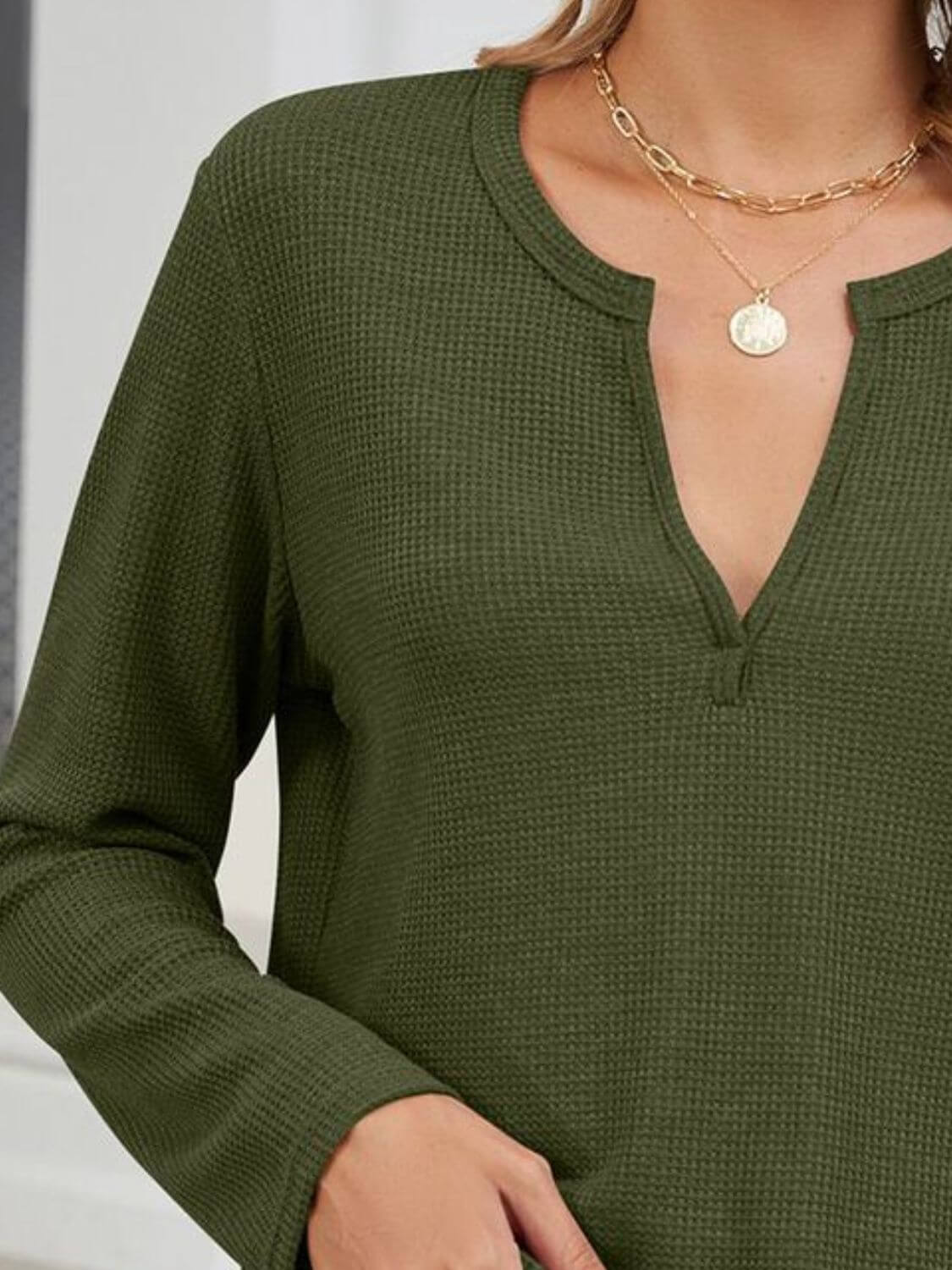 Olive green Bella Road waffle-knit notched long sleeve t-shirt with slight stretch, made of rayon, polyester, and spandex.