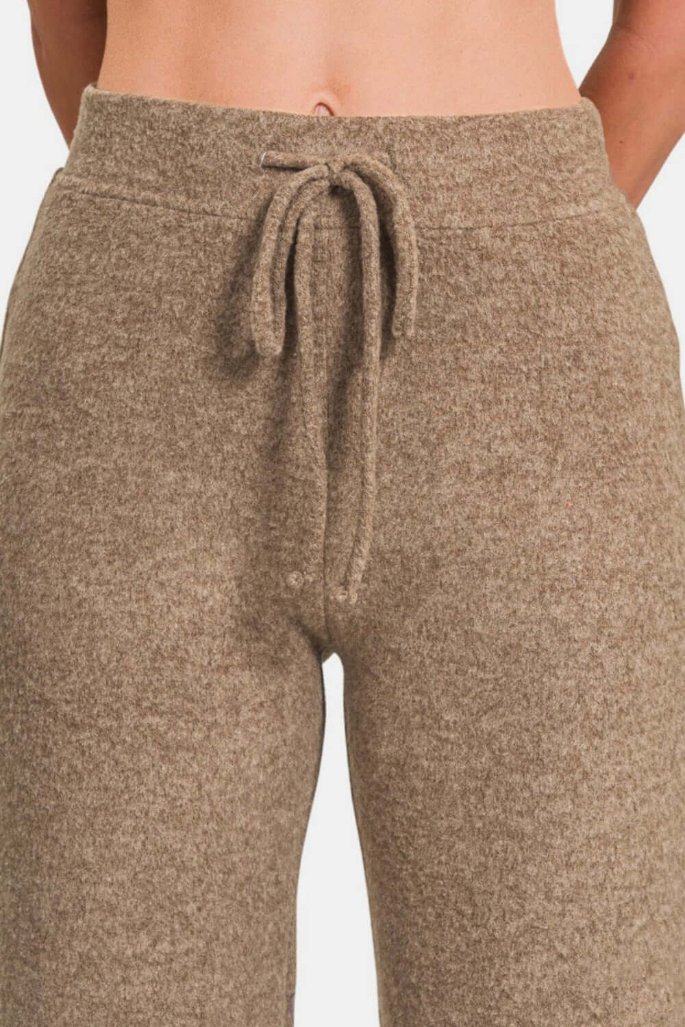 Zenana Drawstring Hacci Cropped Pants in taupe, featuring cozy fabric and a relaxed fit for casual comfort and style.