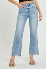 RISEN Full Size High Rise Straight Jeans with frayed hem, high waist, and comfortable fit, modeled standing, showcasing versatility and chic look.