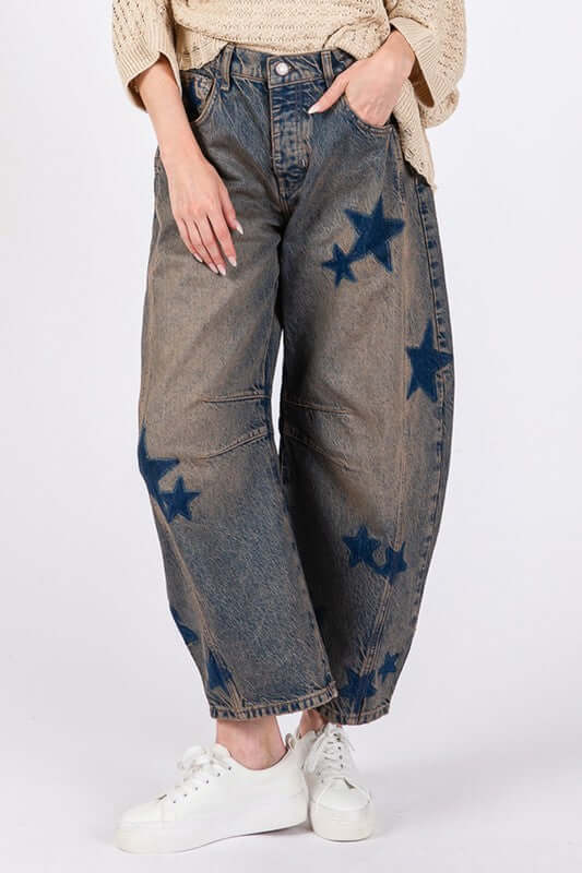 SAGE + FIG Star Wide Leg Jeans with Pockets featuring a chic wide-leg design and star embellishments for a trendy look.