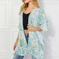 JUSTIN TAYLOR Fields of Poppy Floral Kimono in Green at Bella Road