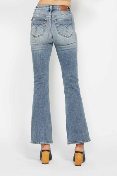 Back view of Judy Blue bootcut jeans with embroidered pockets and tummy control feature, perfect for plus-size styling.