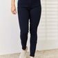 Woman wearing Garment Dyed Tummy Control Skinny Jeans-Judy Blue Jeans-full size, flattering and slimming fit