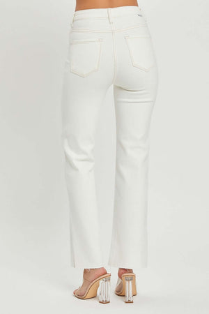 White high-rise straight jeans with raw hem and pocket details, shown from the back, paired with clear block heels.