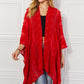 JUSTIN TAYLOR Pom-Pom Asymmetrical Poncho Cardigan in Red at Bella Road